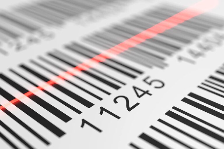 close-up-view-on-red-laser-is-scanning-label-with-barcode-on-pro